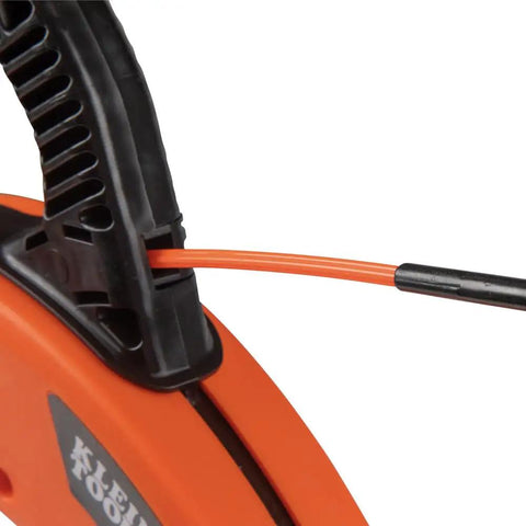 Klein Tools 56380 Non-Conductive Electrical Fish Tape With Multi-Groove Fiberglass Wire Puller showing orange tape in housing.