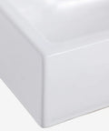 Close-up of Compact Ceramic Vessel Sink With Wall Mount Vanity, highlighting the smooth, glossy edge of the space-saving corner basin.