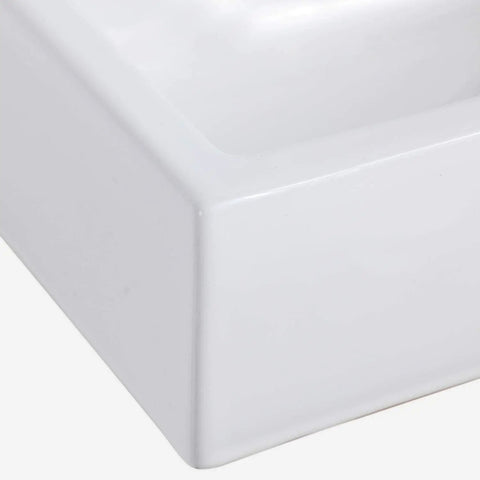 Close-up of Compact Ceramic Vessel Sink With Wall Mount Vanity, highlighting the smooth, glossy edge of the space-saving corner basin.