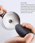 Automatic Milk Frother Wand For Lattes And Cappuccinos, Battery Operated Handheld Foam Maker being used in a milk cup