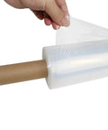 Heavy Duty Industrial Clear Stretch Wrap 4 Rolls 15 Inch Wide By 1000 Feet 80 Gauge Workhorse Grade Pallet Shrink Wrapping Roll being unrolled.