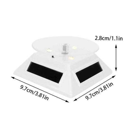 Xhtllo Electric Led Light Solar Powered Rotating Turntable Display Stand For Jewelry Phunique Watches Camera And Decorations with triangular base design.