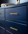 Six Pack 3-Inch Classic Curvature Cabinet Handles In Antique Brass on blue kitchen drawers, vintage-style zinc alloy hardware