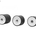 Heavy Duty Rubber Vibration Isolator Mounts With Steel Reinforced Base And Female Thread Bobbin Fitment For Gym Gear Air Compressors And Generators To Smooth Out Jitters And Kill Unwanted Noise In A Set Of Four Pieces - close-up of rubber mounts.