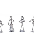 Premium Hand Welded Music Note Statues Set Of Eight Slick Industrial Wire Sculptures For Boss Level Desk Or Shelf Decor. Four metal music figure sculptures, 5-inch tall, showcasing artistic design.