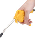 Rock Solid Pneumatic Air Blow Gun With Comfortable Grip And Interchangeable Tip For Sweeping Sawdust Off Trucks And Garage Benches held in hand.
