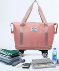 Expandable Travel Tote Bag With Trolley Sleeve And Wheels, Waterproof Oxford Duffel, shown with folded clothes, tablet, and water bottle