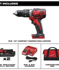 Rock Solid One Half Inch Cordless Compact Hammer Drill Driver Kit Featuring All Metal Gear Case And Rugged Chuck For Tight Quarters With Knockout Performance And Built Like A Tank Durability on display with accessories.