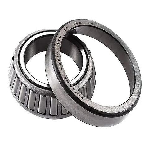 Wheel bearing and race set (front inner), two metal rings visible.
