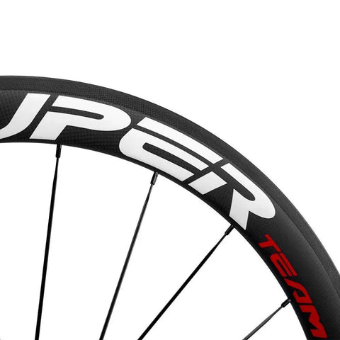 Close-up of 50mm Carbon Clincher Wheelset For Road Racing 700c With 23mm Width Toray T700 Matte 3K Finish UCI Approved White And Red Decals