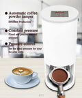 Top Shelf Professional Grade Electric Coffee Tamper For 58mm Commercial Espresso Machine With Stainless Steel Base Auto Sensor And Adjustable Portafilter Holder Wrist Relief beside cup of coffee and portafilter with coffee grounds.
