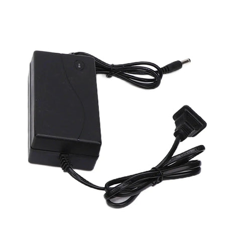 Aramox Cordless Mini Bench Grinder Polisher power adapter with a compact design and connecting cables for battery charging.