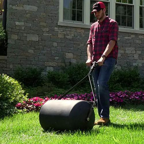 Man using Powerful 270 Lb Poly Lawn Roller For Push Or Tow With Easy Turn Tethered Plug And Quick Filling Drum 18 By 24 Inches Brinly PRC-241BH-A
