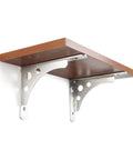 Heavy Duty Shelf Brackets Built Tough For Wall Mounted Floating Shelves Stainless Steel L Bracket supporting a wooden shelf.