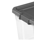 Close-up of 2 Pack 76 Quart Clear Stackable Storage Bins With No Fuss Latch Lids And Dark Gray Covers highlighting durable latch.