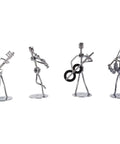 Premium Hand Welded Music Note Statues Set Of Eight Slick Industrial Wire Sculptures For Boss Level Desk Or Shelf Decor featuring four metal musicians playing instruments.