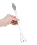 Hand holding Root Rake For Bonsai And Garden Soil Loosening Three Prong Stainless Steel Tool With Ergonomic Handle For Outdoor Yard Work