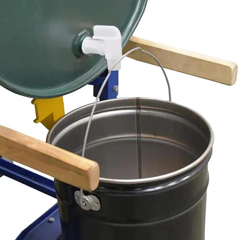 Heavy Duty Plastic Drum Spigot Built To Nix The Drip Drama And Keep Pouring Dead Simple For Three Quarter NPT Water Tanks One Inch Outer Diameters And Six Gallon Jerrycans mounted on a gray drum.