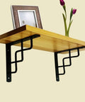 Heavy Duty Metal Wall Shelf Brackets Built Tough To Level Up Your Living Area With A 90 Degree Right Angle Design supporting a floating shelf.