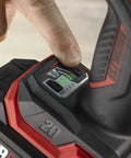 User adjusting speed settings on Tough As Nails Brushless Impact Wrench delivering eight hundred foot pounds of mid torque.
