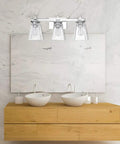Yorke 5-Piece All-In-One Bathroom Set With Chrome Finish And Clear Glass Empire Shade Vanity Lights over double sinks