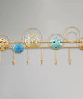 Heavy Duty Wrought Iron Wall Decor With A Dope Partition Rack And Coat Hook This Hand Painted Blue Gold Storage Organizer Sets An Awesome Vibe While Keeping Things Sleek featuring colorful circular accents and five hooks.