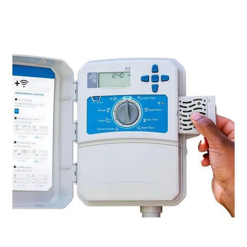 Remote Management Accessory For X2 Module With Bluetooth Wi Fi Direct Or WPS Setup in use, showing controls and display