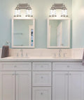 2 Light Vanity Light Fixtures In Modern Brushed Nickel Finish For Bathroom Over Mirror Industrial Sconces Wall Lighting With Hammered Glass Shades Vintage Industrial Style Boss Level Glow Ready To Install above white bathroom vanity with double sinks.