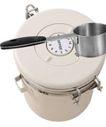 Sleek Stainless Steel Coffee Bean Storage Jars With Reliable Tight Seal Lids To Keep Your Morning Java Fresh As A Sick Kitchen Stack Canister Set Of Three For Tea Cereal And Snacks, overhead view with measuring scoop.