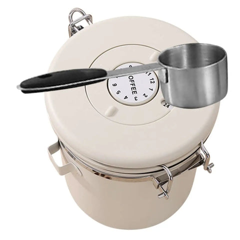 Sleek Stainless Steel Coffee Bean Storage Jars With Reliable Tight Seal Lids To Keep Your Morning Java Fresh As A Sick Kitchen Stack Canister Set Of Three For Tea Cereal And Snacks, overhead view with measuring scoop.