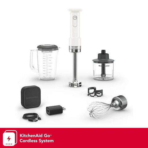 Cordless Hand Blender With Battery Included And Removable Blending Arm Features Stainless Steel Blades Plus Whisk Attachment collection with pitcher and charger.