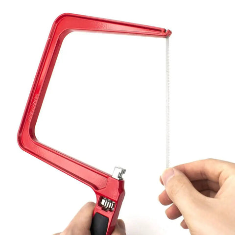 Heavy Duty Frame Coping Saw With Five Interchangeable Blades For Cutting Wood Metal Plastic Rods And Pipes Straight Up Built To Last. Red frame.