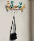 Dang Strong Wall Mounted Coat Rack For Entryway With Multi Purpose Iron Hooks Bag And Hat Hanger Key Storage Tray featuring decorative leaf design.