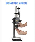 Heavy Duty Manual Arbor Press Machine With Ball Bearing Design Includes Adjustable Scale Plate Swivel Drill Chuck And Backing Plate Best For Riveting Stamping Forming Leather Plastic Wood Aluminum Projects Sweet Setup Rad Gear For Shop Use with hands installing a drill chuck.