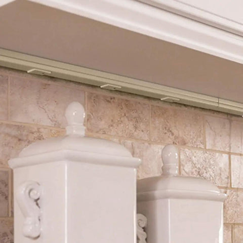 Ivory Wall Mount Power Strip With 6 Outlets 3 Foot Steel Under Counter Cable Management Center installed under kitchen counter.