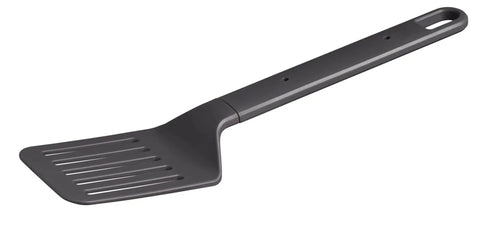 Slotted spatula from the Wildfare Core 12 Piece Stainless Steel Fry Pan Cook Set With 1 Qt Fry Pan Fold and Lock Handle Plates Utensils