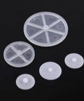 Plastic Gears Kit With Pulleys Belts For DIY Robot Motors And Model Projects Six Gear Sets 34 Gear Packages on black background