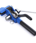 Close-up of stainless steel banding tool for strapping tensioner and crimping cutter, hand guided for heavy duty fastening.
