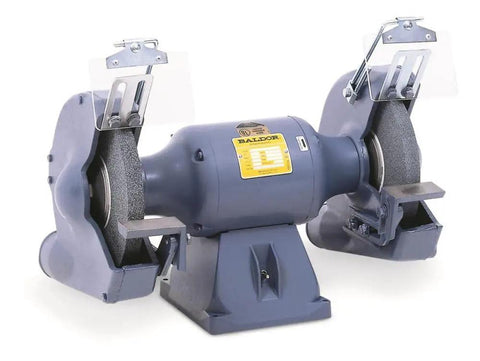 Badass 10 Inch Bench Grinder Featuring Solid Cast Iron Tool Rests Dual Grit Wheels Base Switch Motor Built Damn Tough For Relentless Shop Hustle And Serious Metal Fabrication Work with safety shields and dual grit wheels.