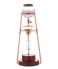 Top Shelf Cold Brew Coffee Maker Tower Featuring Adjustable Drip Control And Detachable Glass Carafe For Silky Smooth Iced Coffee And Rich Tea Brewing At Home with glass and steel construction.
