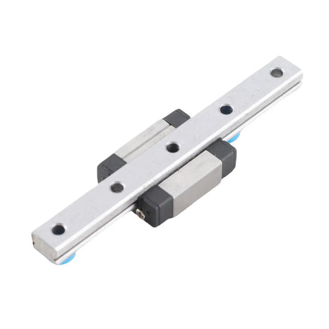 Precision Linear Rail Guide with 7mm wide slide block, visible ball retainer and lubrication system for smooth glide.