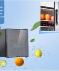 Compact Upright Mini Freezer Featuring A Sleek Black Glass Door With Energy Efficient Cooling That Runs Dead Quiet At Twenty Eight Decibels Ideal For Dorms Offices Or Small Bedrooms With Plug And Play Design - showing exterior, concealed handle, and visible contents.