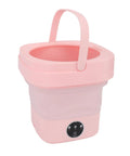 No Sweat Foldable Mini Washing Machine, Portable Compact Washer in pink, designed for quick cycles and small spaces.