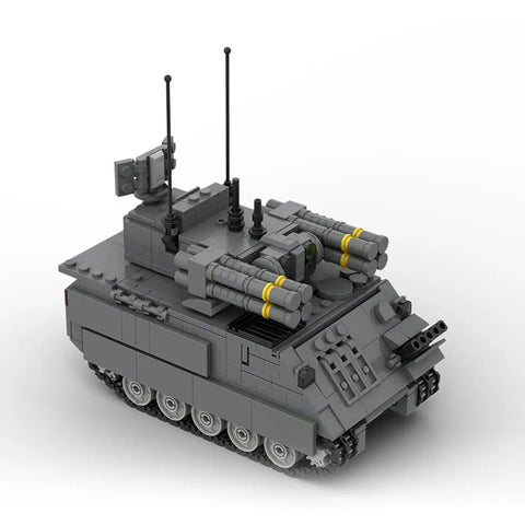 Kickass M113 Military Vehicle Building Blocks Set For Adults, 909 Piece Heavy Duty Construction Kit with detailed gray bricks.