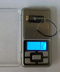 Crossfire Micro Receiver V2 Super Tiny Lightweight UHF Long Range For Mini And Micro Quads on digital scale showing 3.2g
