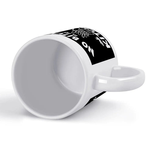 No Bitchin' In My Kitchen 11 Oz Ceramic White Mug With Comfortable Handle, visible interior and text design, lying on side