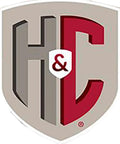 H&C logo in a shield shape featuring gray and red letters, representing quality concrete and masonry products.