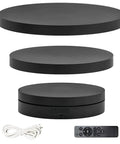 Show Off Your Cool Stuff With This Electric Rotating Display Stand That Spins 360 Degrees Smoothly Featuring A Handy Remote Control, Three Speed Modes, And Flexible Power Options For USB Or Battery To Make Your Products Pop At Home Or In Business. Black rotating display stand with three platforms and remote, USB power options.