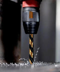 Close-up of Hyper Step HSS Cobalt Drill Bit Set 1/8 To 1/2 Inch, 13 Pc Stubby TurboStep in metal drilling operation.