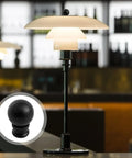 Two Pack Black Lamp Finials With Metal Knob Tops For Lampshades Screw Cap Nut Style Durable Die Cast Aluminum Minimalist Globe Design Decorative Replacement For DIY Table Or Floor Lamps shown installed on a modern table lamp.
